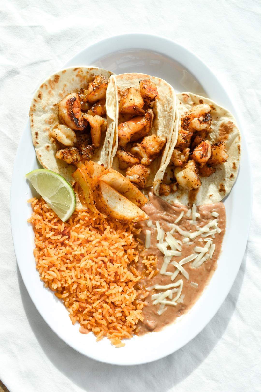 Shrimp Tacos with rice and beans